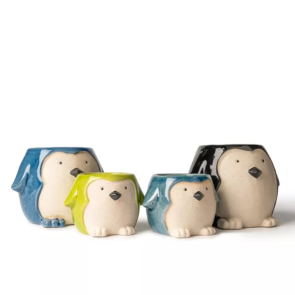 حاملي الشموع الخزفية على شكل البطريق